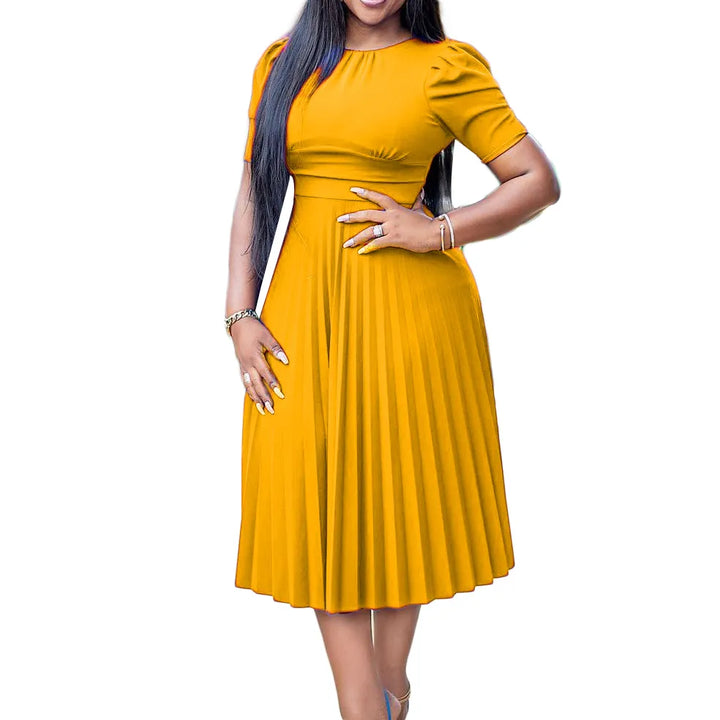 Women's plus size knee-length pleated dress with short sleeves. Elegant A-line cut for a flattering look.