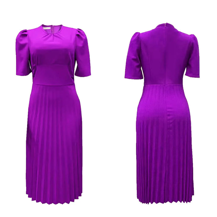 Sophisticated plus size women's pleated A-line dress, knee-length, short sleeves, with elegant peplum detail.