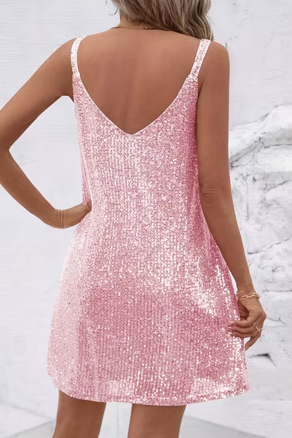 Close-up: Dazzling sequin detail on a women's V-neck mini dress. Ideal for glamorous evening parties.