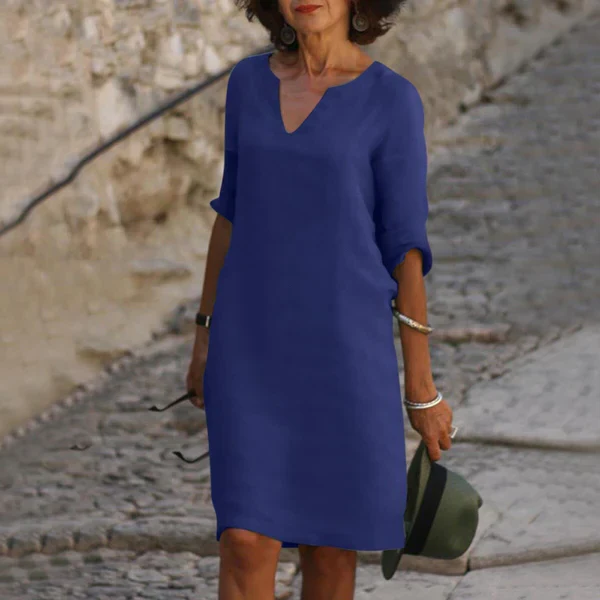 Versatile women's elegant V-neck midi dress with three-quarter sleeves, ideal for casual or dressy wear.