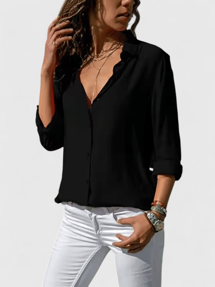 Trendy V-neck women's blouse, an elegant top for summer fashion, work, or sophisticated casual outings.