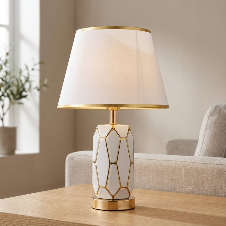 Elegant white ceramic table lamp with a soft linen fabric shade, perfect for modern vintage home decor.