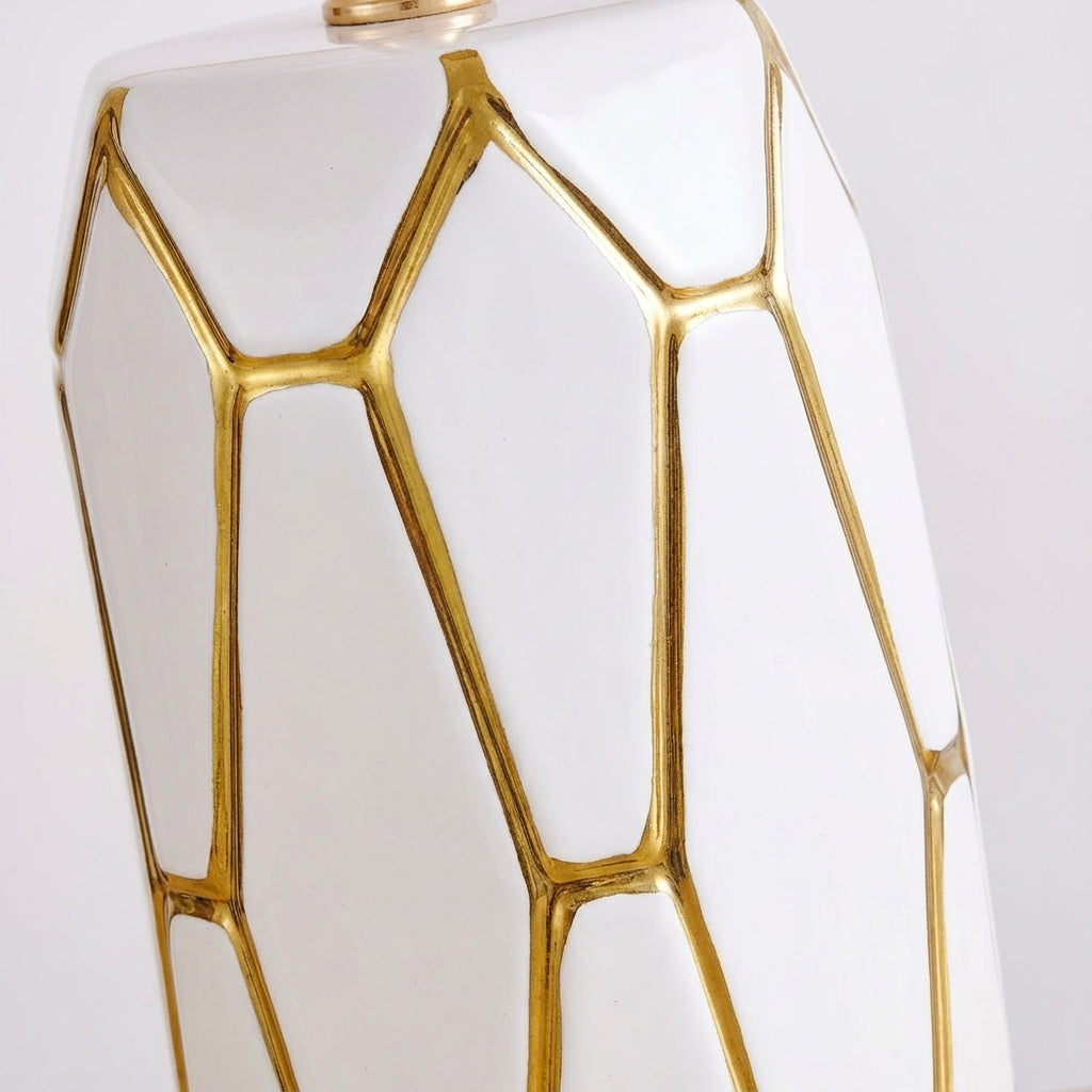 Beautiful ceramic table lamp with a sophisticated fabric shade, ideal for living room or bedroom accent lighting.