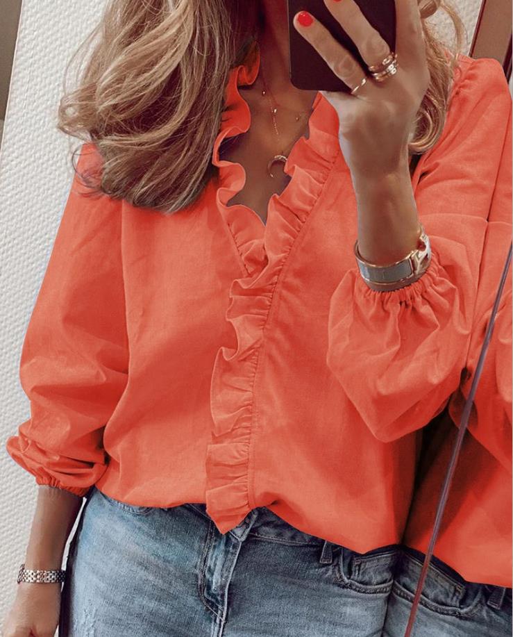 Women's elegant ruffled V-neck blouse, a bestseller for sophisticated and chic fashion outfits.