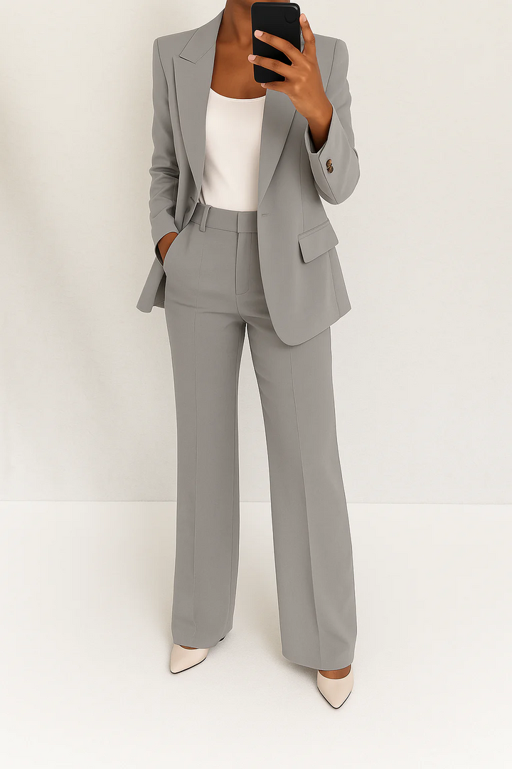 Professional women's suit set with a chic blazer and comfortable wide-leg pants. Ideal for business meetings.