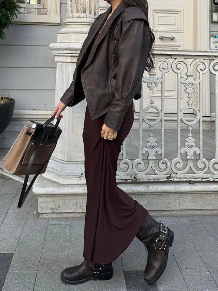 Timeless women's belted jacket, an elegant wardrobe staple. Perfect outerwear for a chic, classic look.