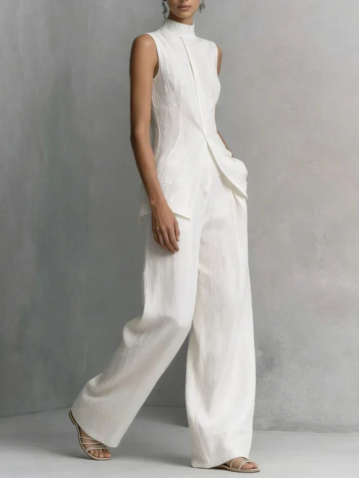 Stylish women's high neck wide leg jumpsuit, versatile for office fashion or elegant evening wear. A modern choice.