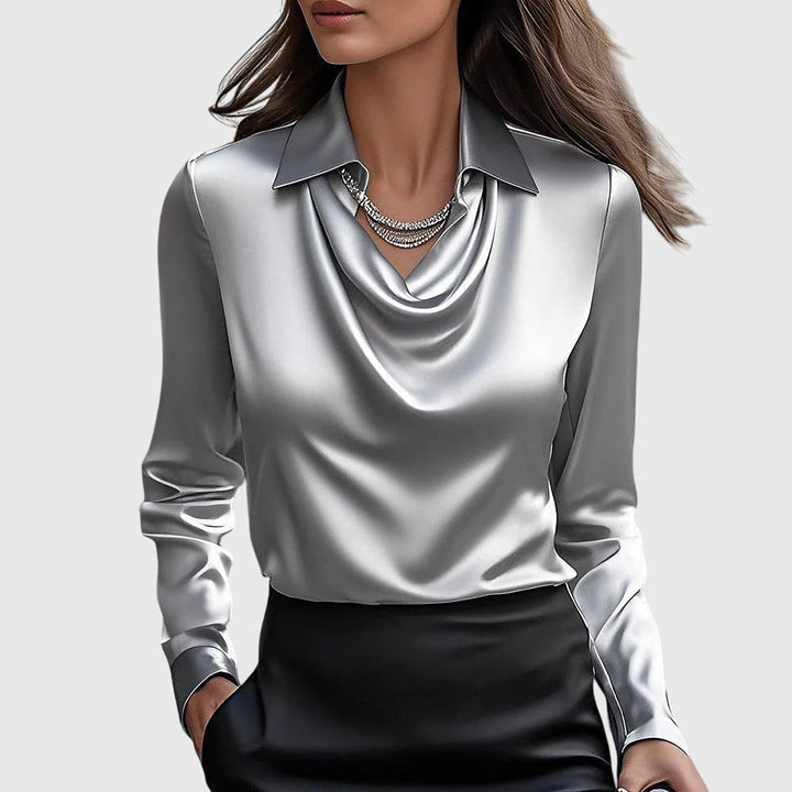 Chic gold pleated blouse for women. Elegant top with flowing fit, ideal for dressy or casual wear.