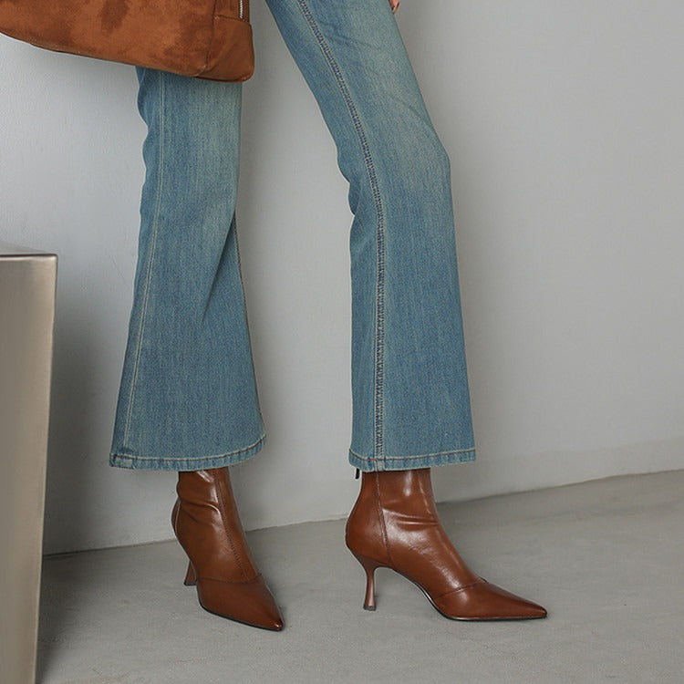 Fashionable brown pointed-toe heeled boots for women, perfect for dressy or everyday chic outfits.