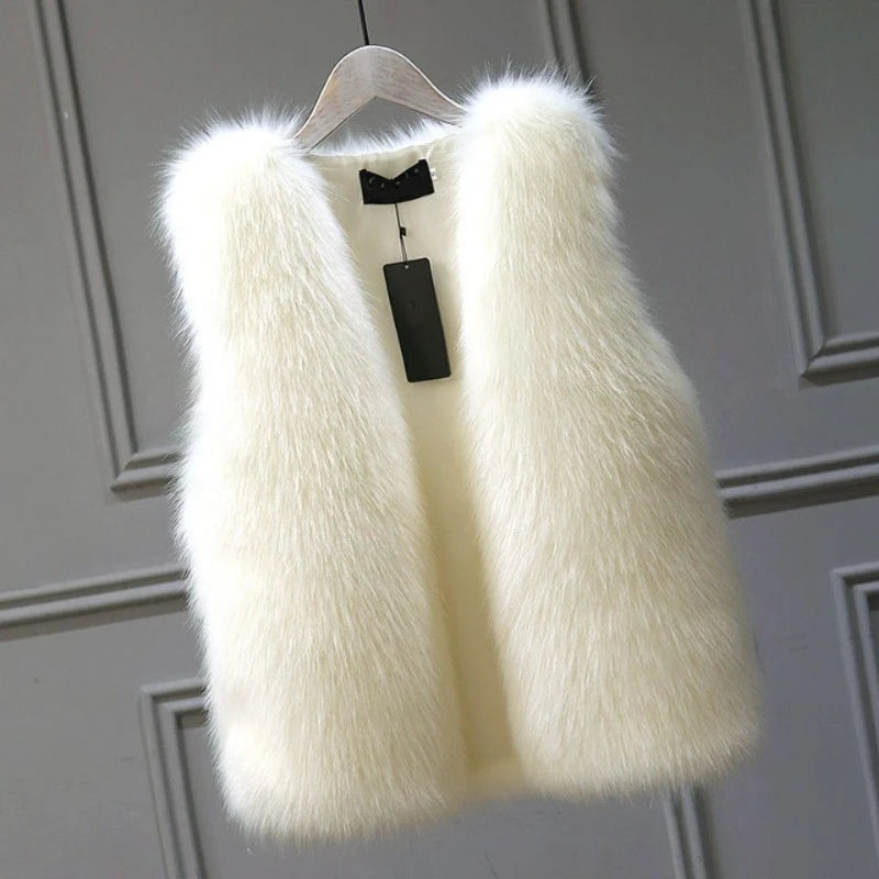 Elegant women's black winter vest, perfect for layering. Luxurious warmth and chic fashion outerwear.