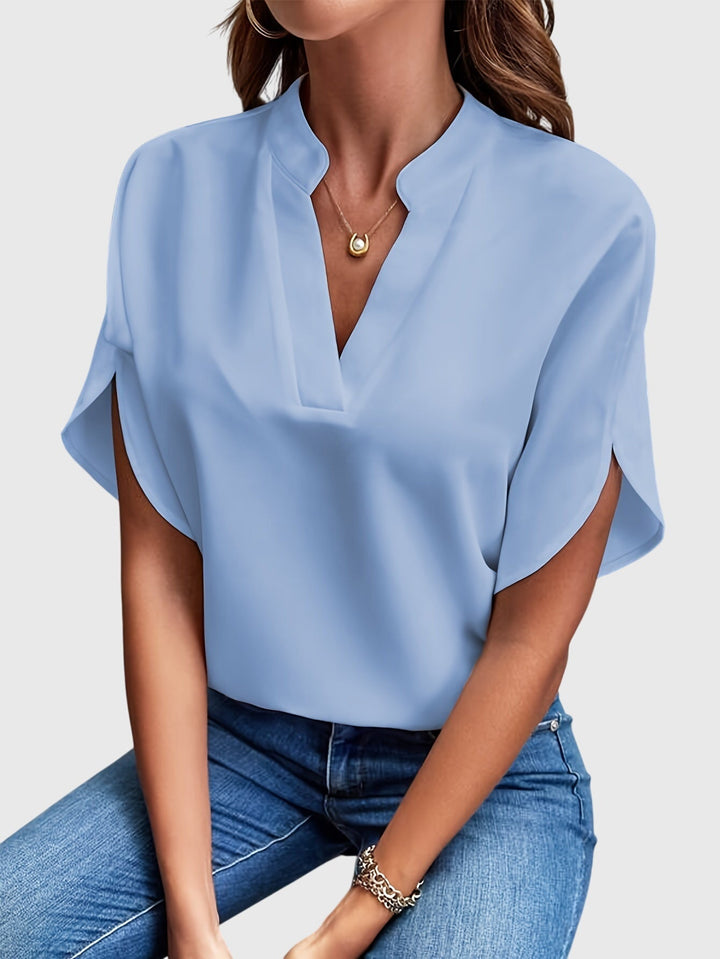 Elegant women's versatile blouse, a classic top offering comfort and style for any event.