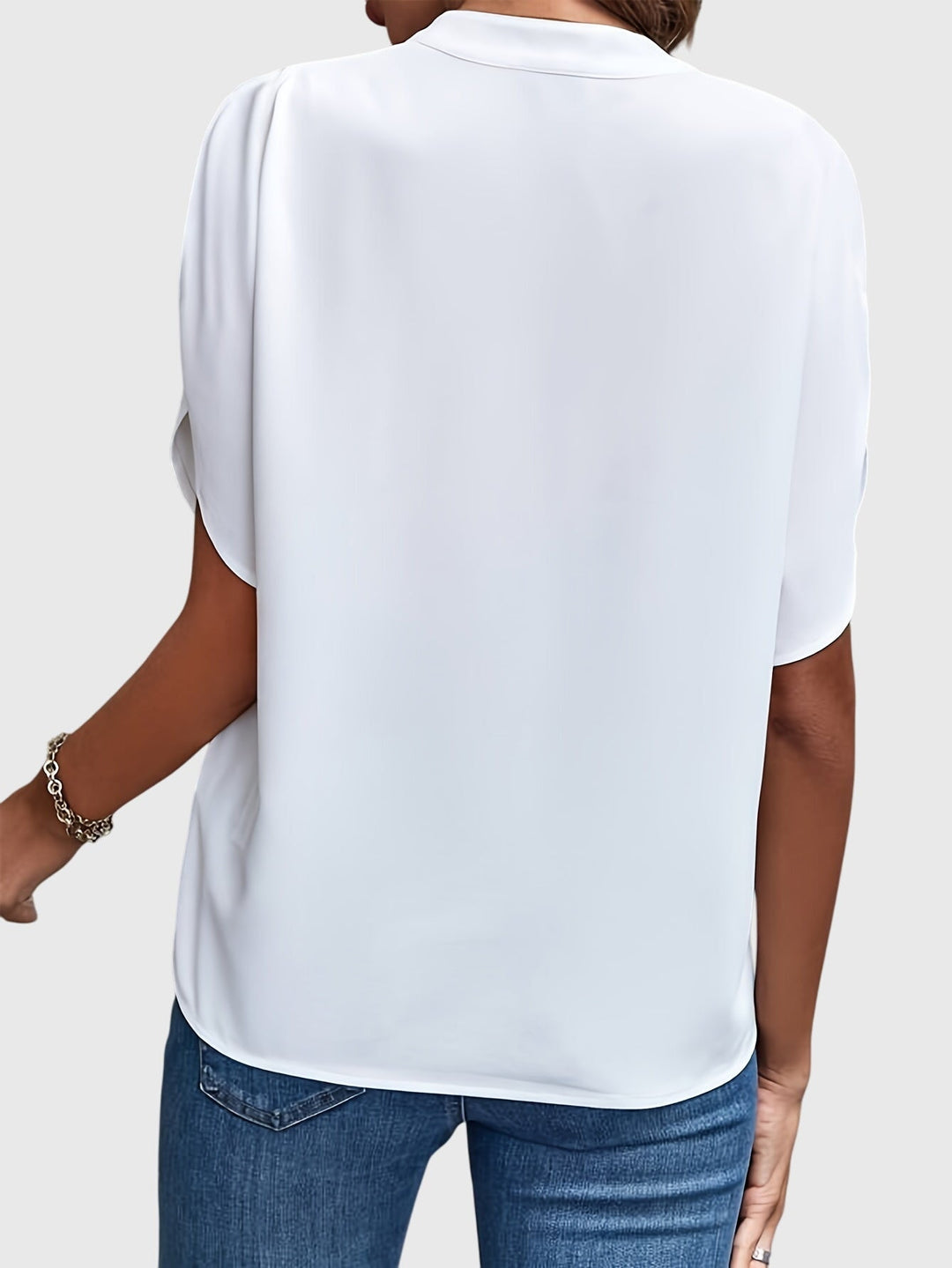 Chic women's blouse, a comfortable classic top for any occasion and stylish fashion.