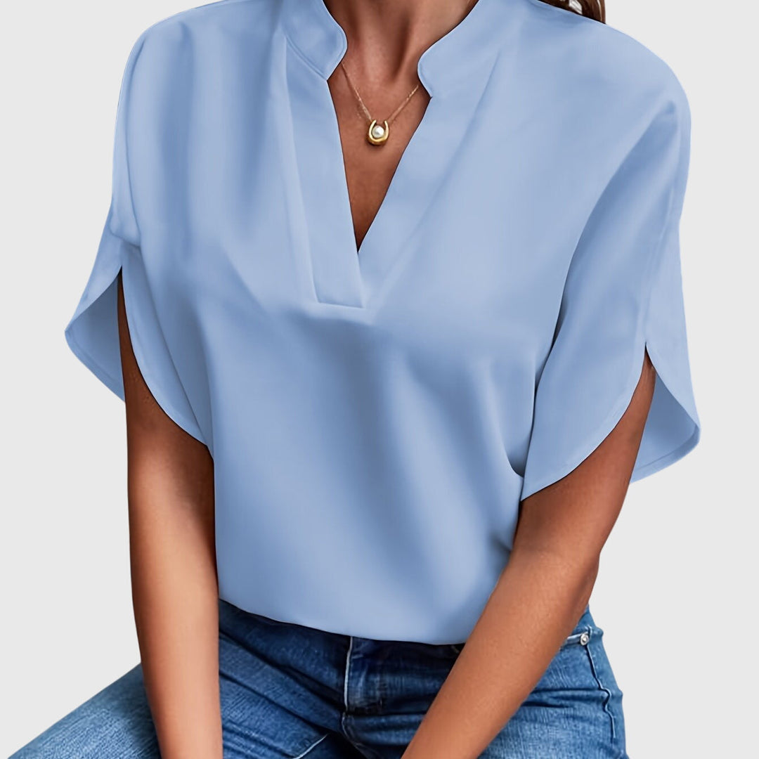 Women's elegant office blouse, a stylish and comfortable top perfect for professional settings.