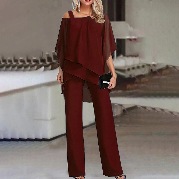 Versatile women's two-piece pants set with cold shoulder top. Ideal for casual chic or party wear.