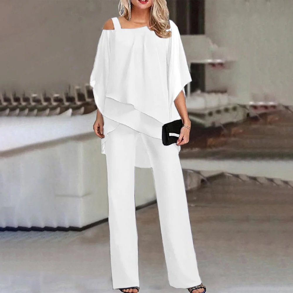 Stylish women's cold shoulder two-piece set. Elegant top and comfortable pants for any event.