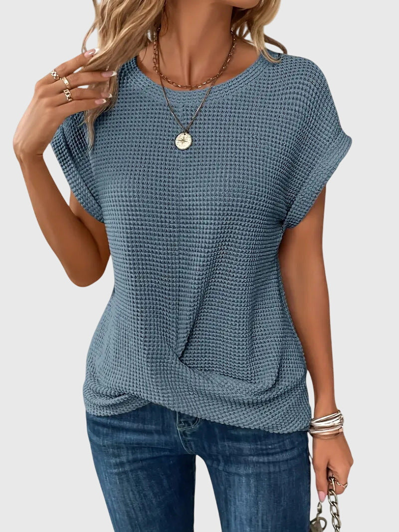 Fashionable women's crew neck blouse. Ideal for elegant workwear, stylish casual looks, and versatile fashion.