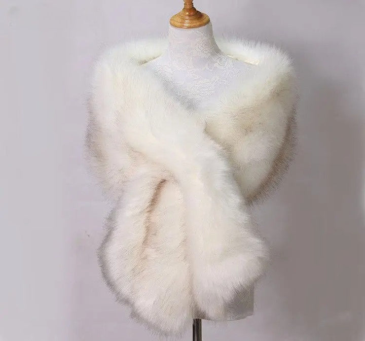 Elegant women's faux fur shawl, a soft and cozy winter fashion accessory for a sophisticated look.