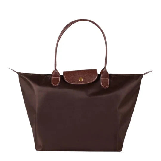Spacious faux leather shoulder tote bag for women. An elegant & organized everyday fashion accessory for any outfit.