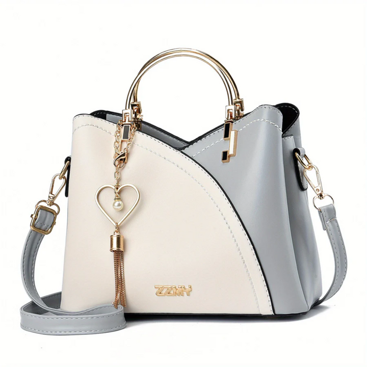 Sophisticated ladies' faux leather purse. Elegant shoulder bag for modern women's fashion.