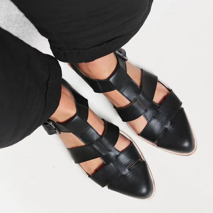 Chic red women's flat strap sandals, perfect for warm weather and everyday fashion. Comfortable summer shoes.