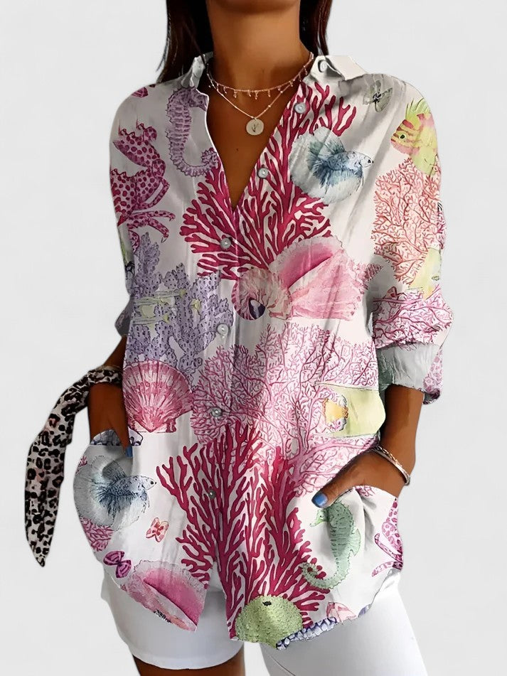 Pretty women's floral top, an elegant and feminine blouse perfect for versatile styling.
