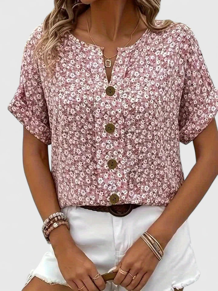 Women's elegant floral blouse with a chic print & long sleeves. Perfect fashion top for any occasion.