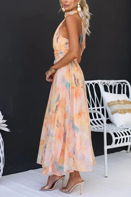 Beautiful women's floral halter maxi dress, a long elegant style for formal events, summer weddings, or party wear.