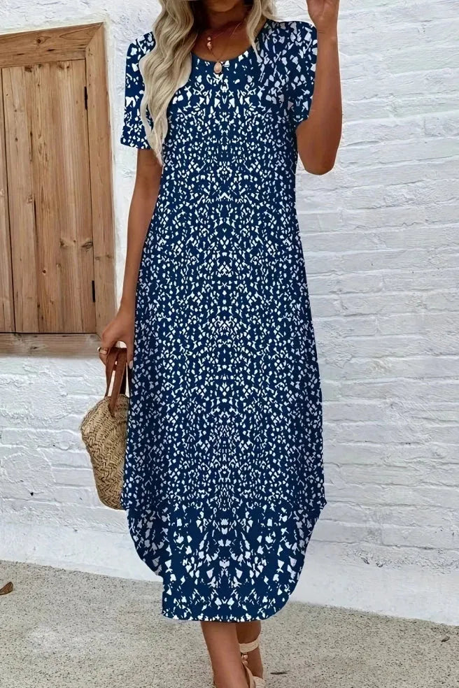 Flowy women's floral maxi dress, comfortable and elegant. Ideal summer long dress for any outing.