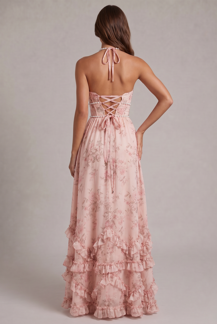 Stylish women's halter maxi dress with vibrant floral print, perfect as elegant occasion wear or a summer party dress.