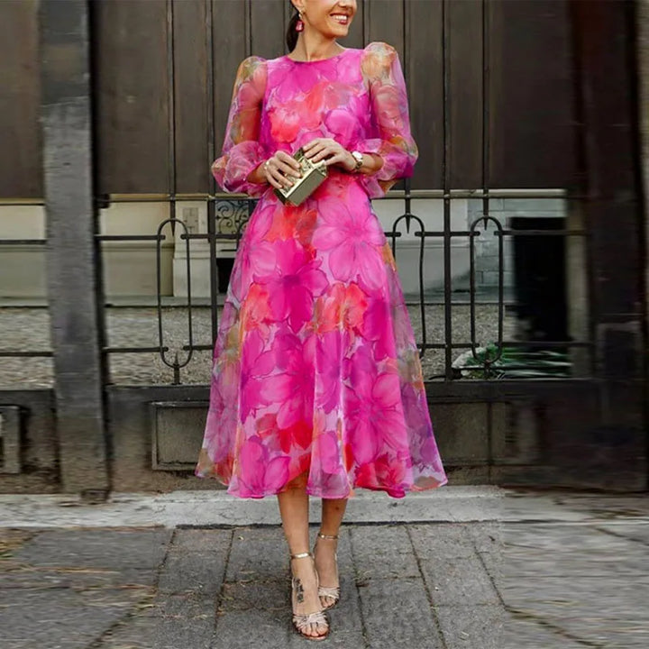 Elegant women's floral midi dress with long sleeves, perfect as a wedding guest or formal party dress.