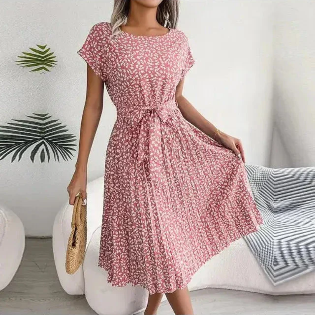 Chic women's floral pleated midi dress, ideal for summer parties or a stylish casual look.