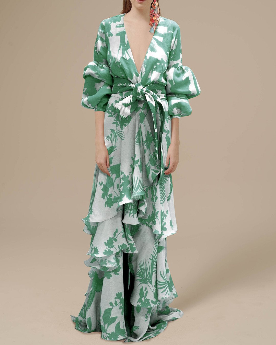 Front view of a beautiful floral print long sleeve maxi dress with ruffles & a waist-cinching belt for women.