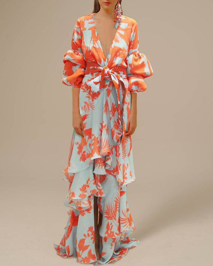 Flowy women's floral ruffle maxi dress with long sleeves & belt, ideal for elegant party or wedding guest attire.