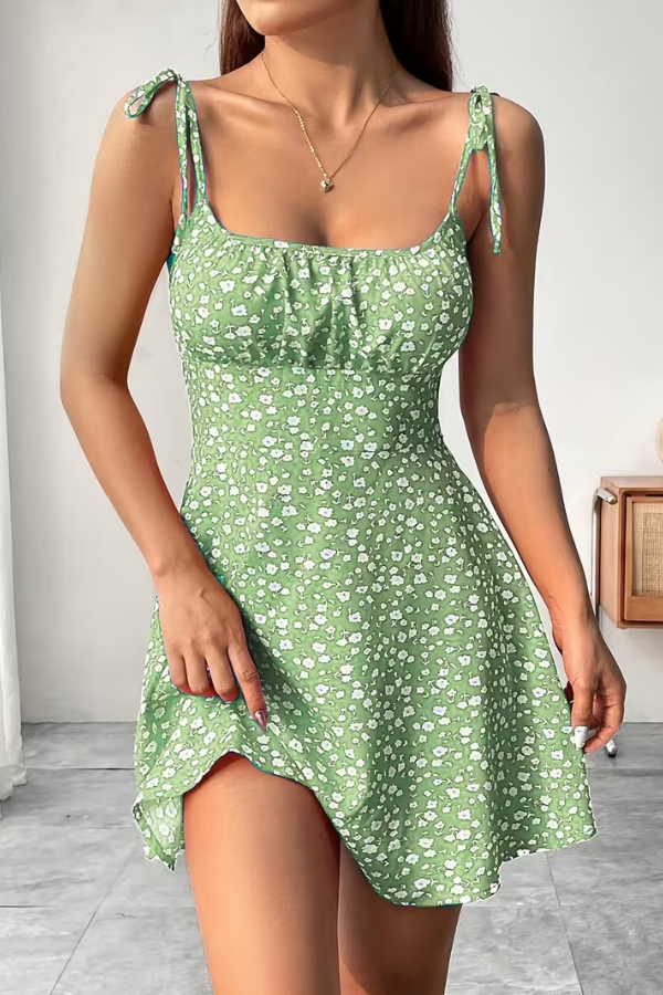 Beautiful floral print strapless slip dress for women. Flowy fabric, elegant design for summer, evening, or party.