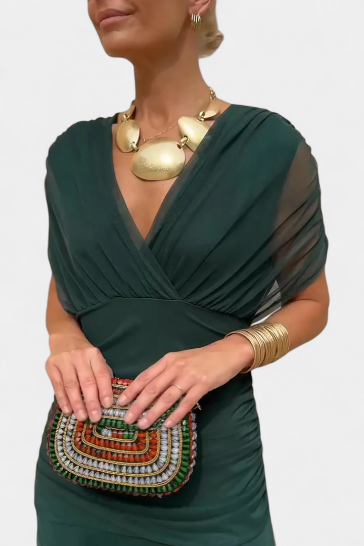 Trendy women's flowing maxi dress, V-neck, ruched waist; a must-have for versatile fashion outfits.
