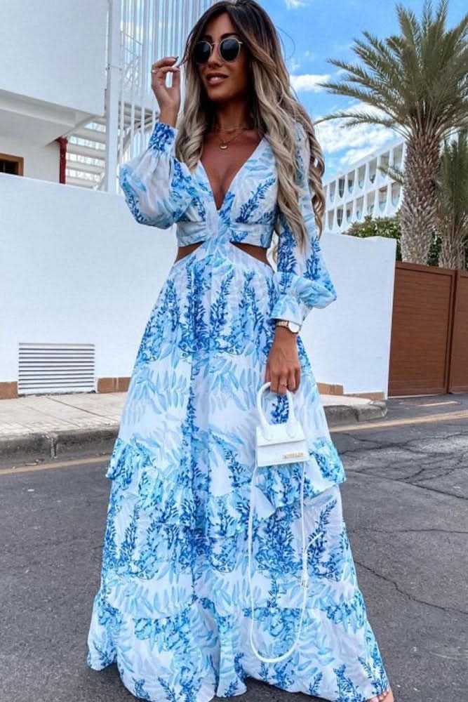 Elegant women's flowy maxi dress in a vibrant color, perfect for summer vacations & evening wear.