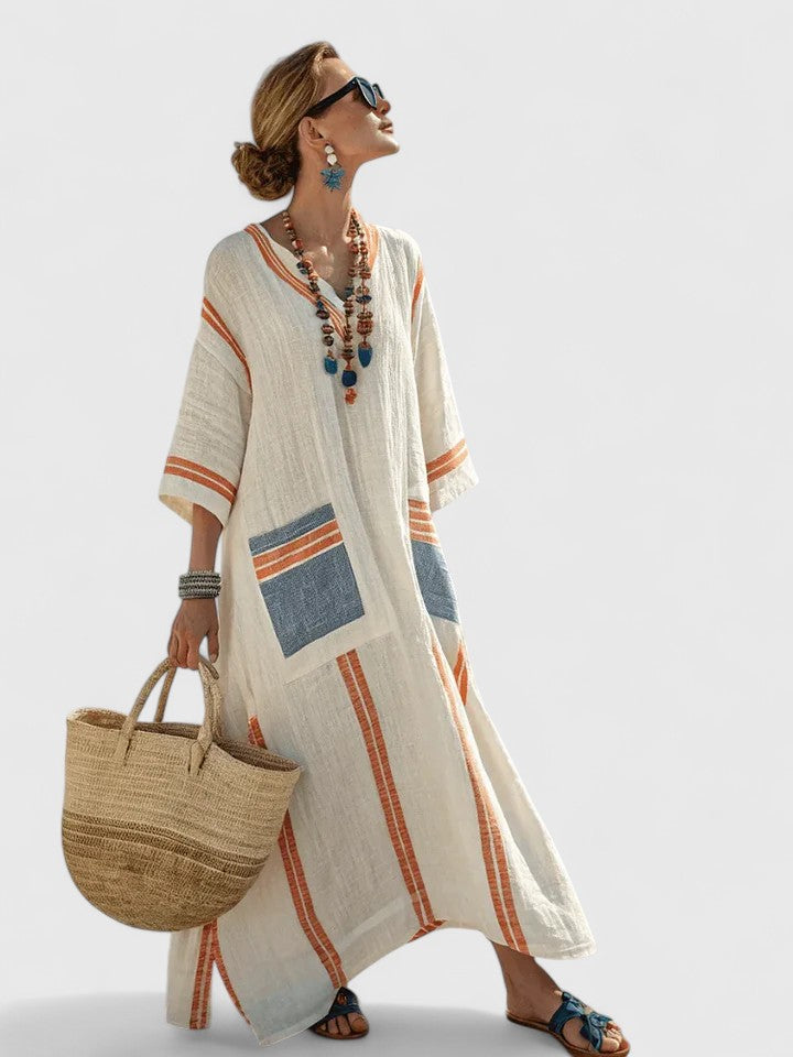 Long women's flowy maxi dress with an elegant design, versatile for both casual and sophisticated evening wear.