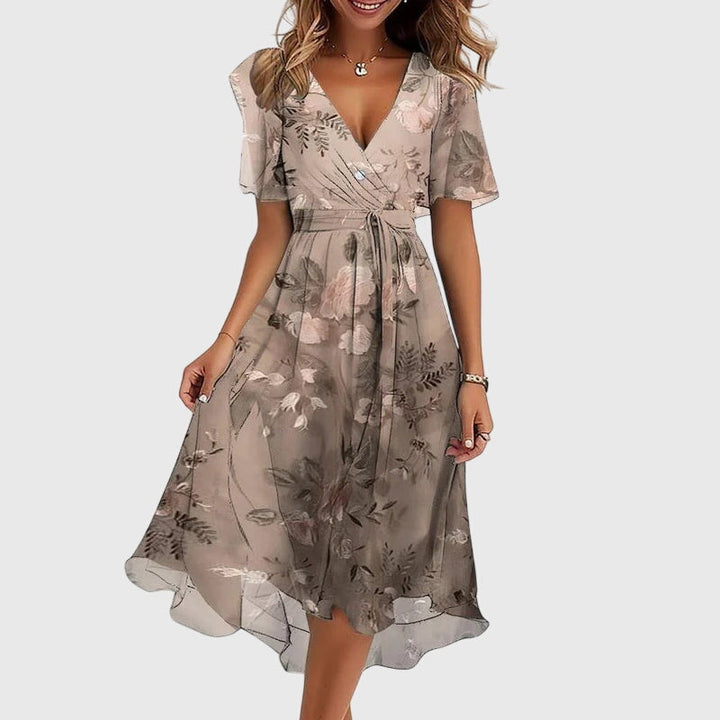 Stylish women's elegant midi dress, a flowy summer fashion essential with a flattering V-neck and comfortable fit.