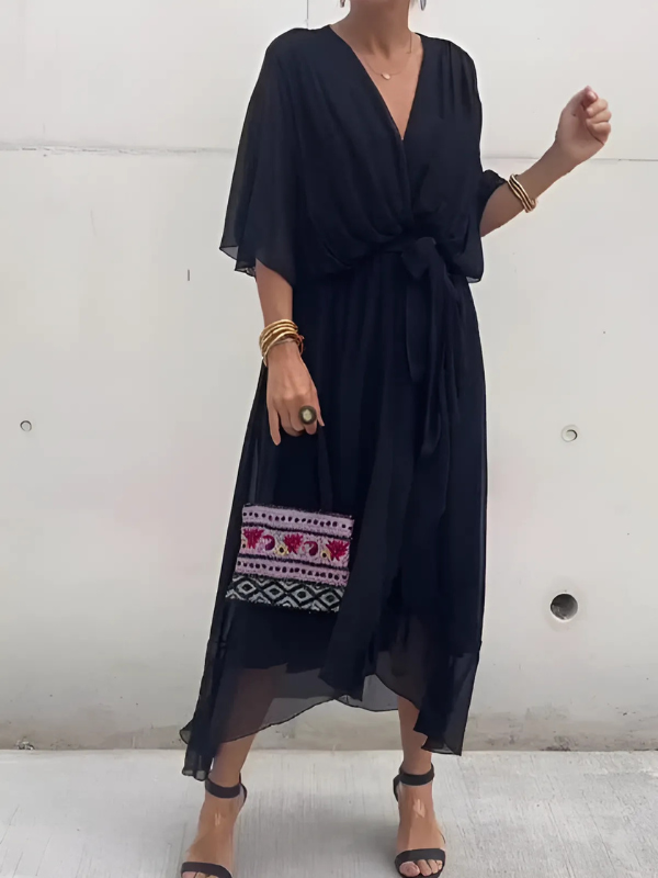 Relaxed yet elegant women's belted maxi dress. The V-neck and flowy design offer supreme comfort for summer days.