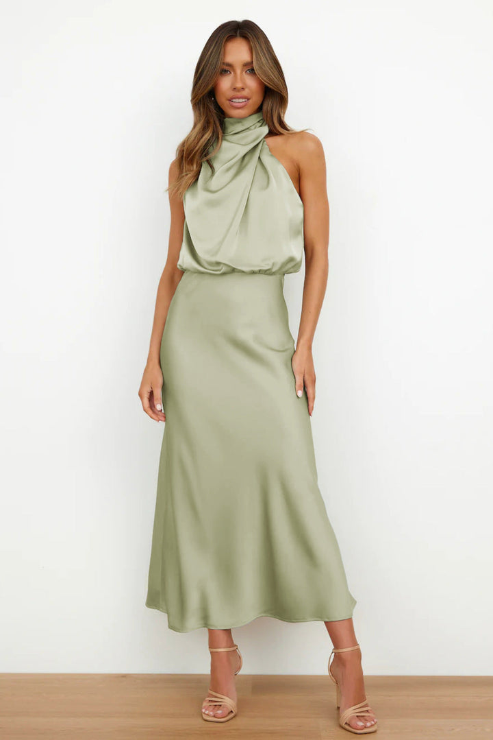 Elegant women's halter evening dress, floor-length, perfect for formal events & galas.