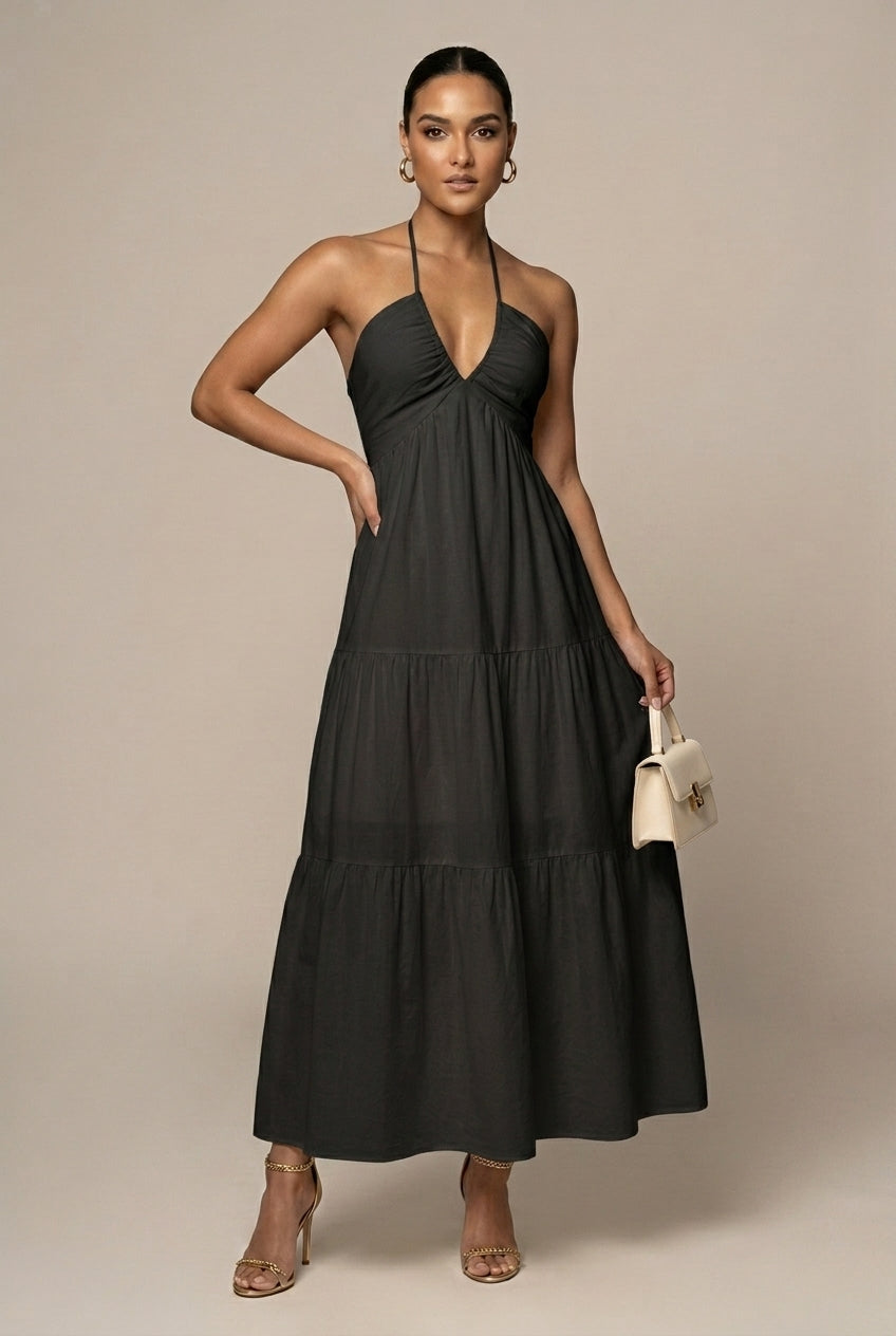 Formal women's halter dress. Elegant tiered ruffle skirt, open back, perfect as a wedding guest or evening dress.