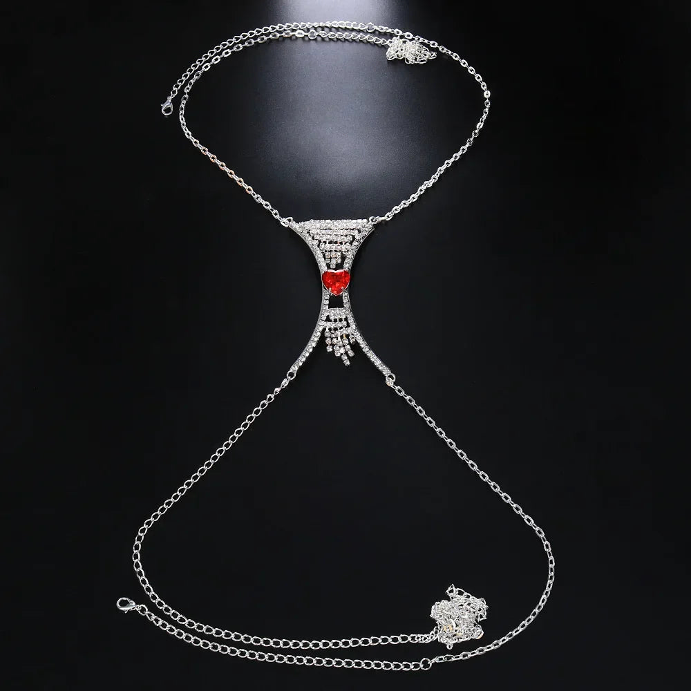 Women's elegant heart crystal chest body chain, sparkling rhinestone jewelry accessory for glamorous parties.
