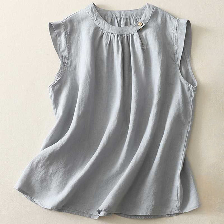 Women's elegant high collar shirt with sophisticated pin-tuck design, versatile for office or casual wear.