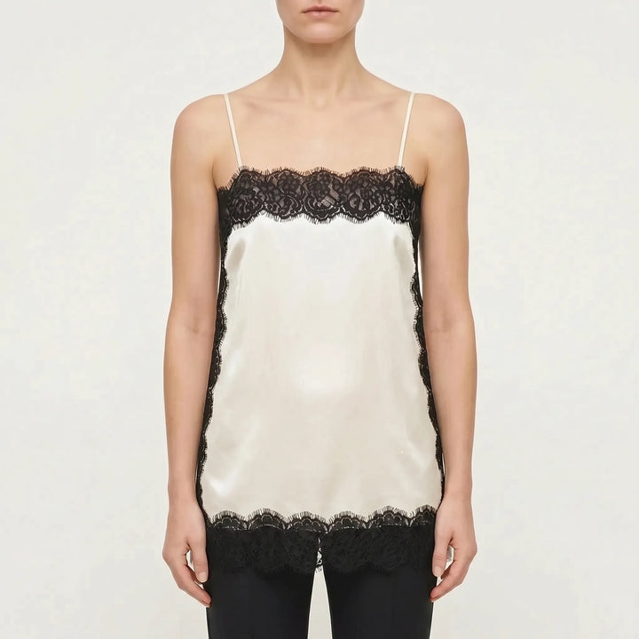 Women's elegant lace-trim camisole top for versatile layering & chic fashion. Sleeveless and comfortable apparel.