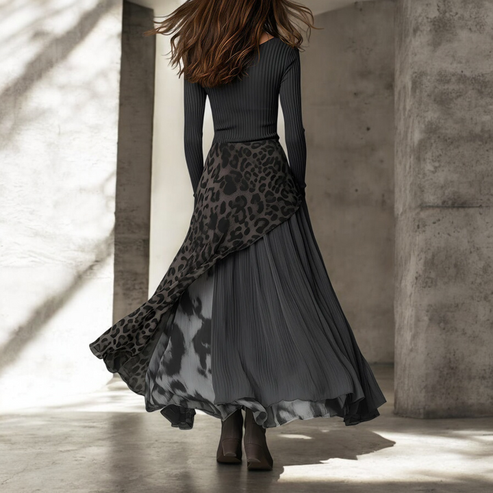 Chic women's long maxi dress with sophisticated leopard print details, offering a fashionable and versatile look.