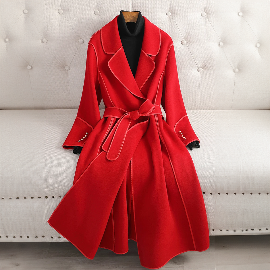 Modern women's long trenchcoat featuring a stylish belted design, perfect for elegant formal or casual outerwear.