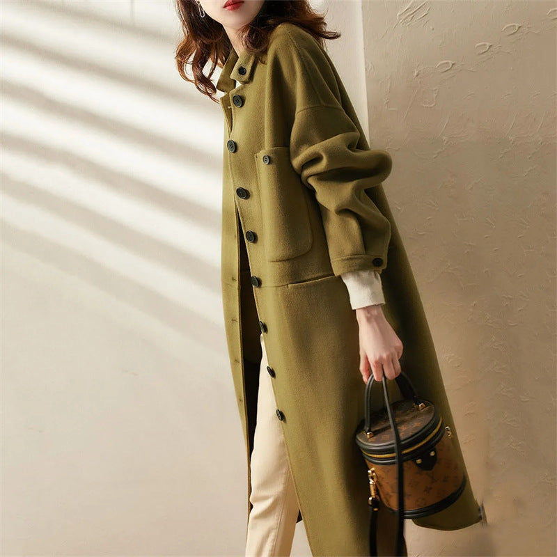 Chic women's long trench coat. A stylish and versatile piece for formal wear or casual fall/spring outfits.