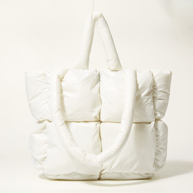 Elegant women's luxury shoulder bag. Smooth nylon handbag, designed for versatile everyday fashion and comfort.
