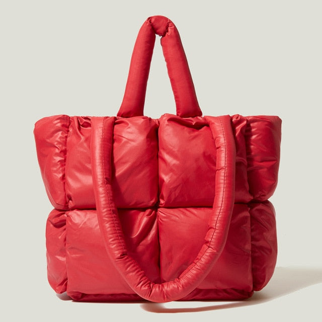 Women's elegant luxury shoulder bag, easily converts to a stylish crossbody bag. Durable nylon everyday handbag.