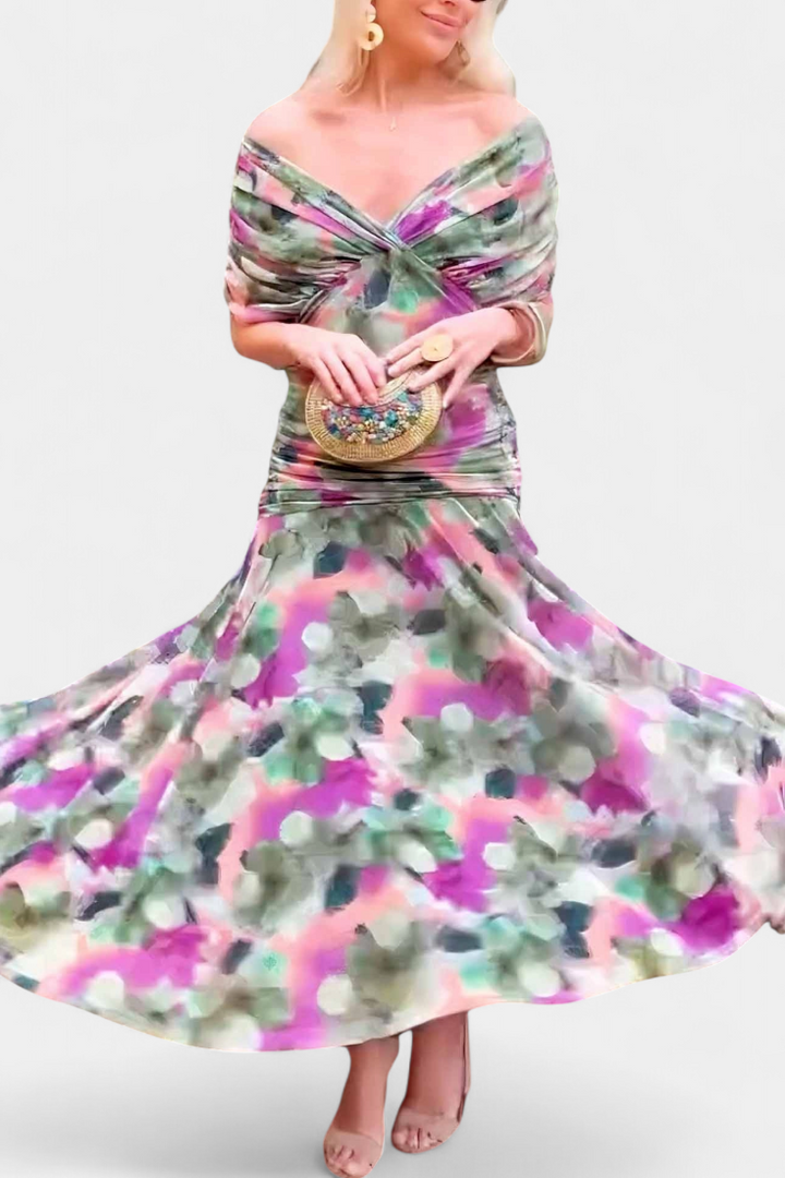 Maxi length formal dress for women, designed with a pleated waist, great for special events.